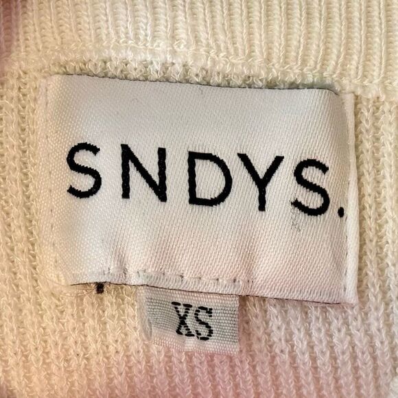 Revolve SNDYS Off-White Front Tie Knit Long Sleeve Sweater Dress With Side Slits - Picture 6 of 10